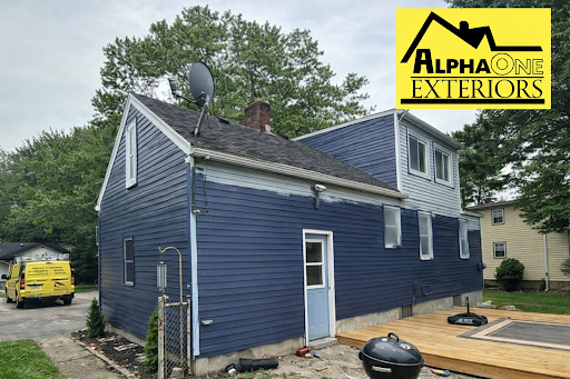 Freshly painted blue house exterior in Dayton, Ohio – residential siding painting project