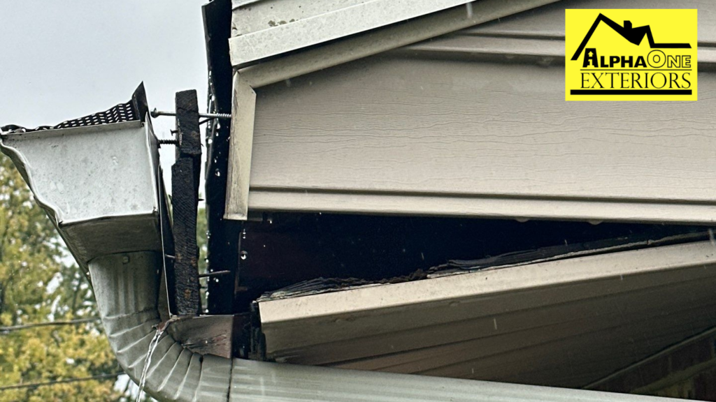 Damaged gutter and fascia on a home in West Carrollton Ohio showing water overflow and structural gutter failure.