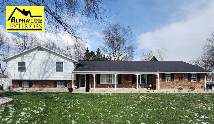 Dayton Ohio home with 3-tab asphalt shingle roof representing a lower-cost roofing option compared to architectural shingles.