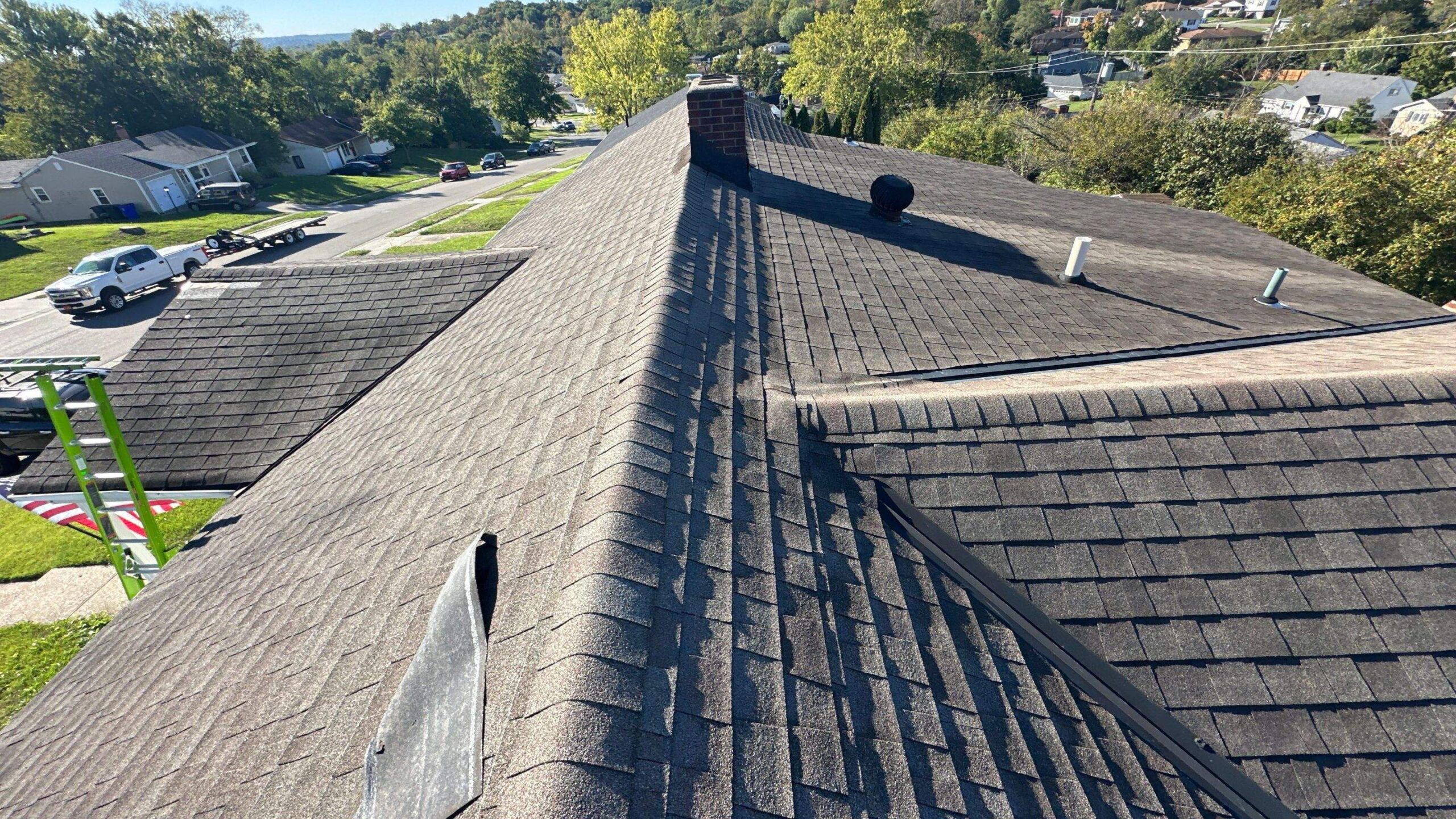 Aging asphalt shingle roof before replacement in Dayton Ohio