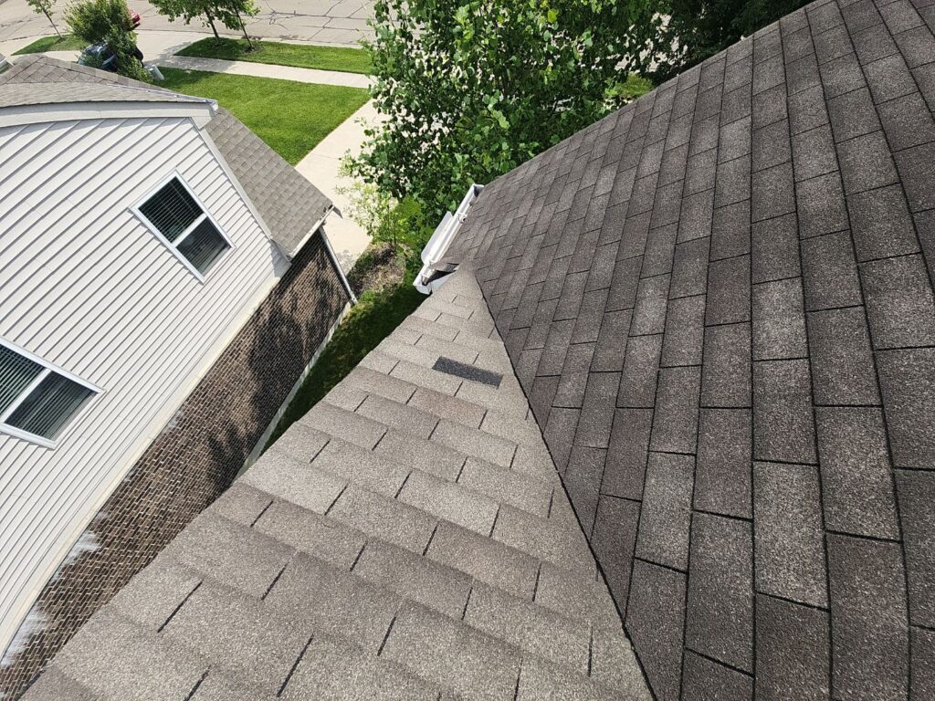 Missing asphalt shingle caused by wind damage on a residential roof in Springboro, Ohio