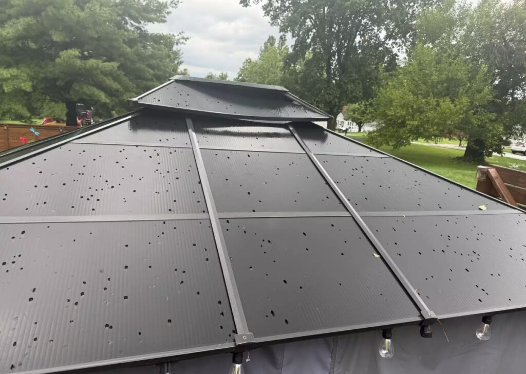 Hail covering a metal gazebo roof during the August 7 2026 hailstorm in Miamisburg Ohio