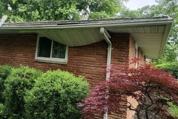 Loose soffit panels damaged by wind on a residential home in Beavercreek, Ohio
